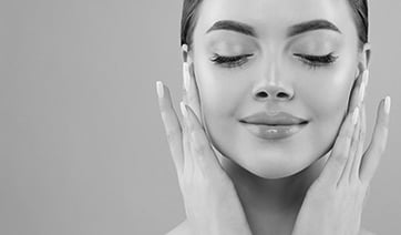 young-woman-eyes-closed-hands-by-ears-1