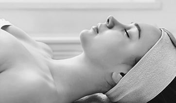 young-woman-laying-down-purple-head-wrap-1